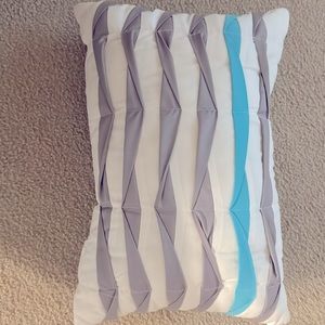 Grey and teal striped accent pillow
